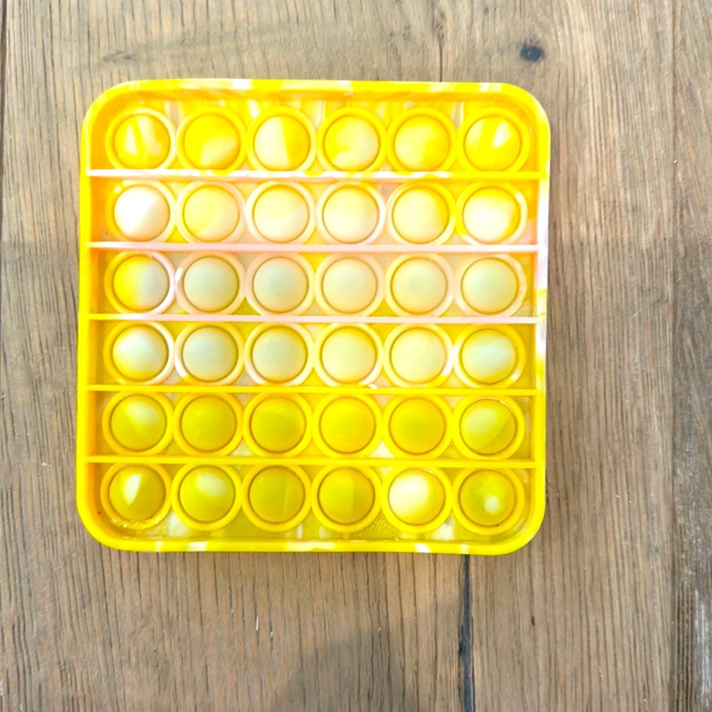 Yellow and pink square pop it tye dye